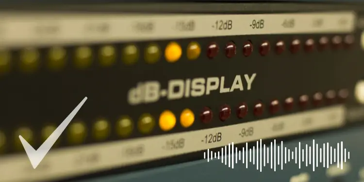 Detailed view of decibel meter showing sound levels with confirmation indicator.