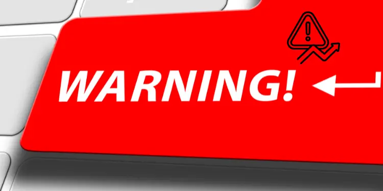 Prominent red keyboard button showing warning message with alert symbol.