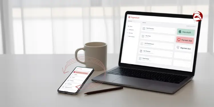 Phone and laptop syncing personal budget dashboard