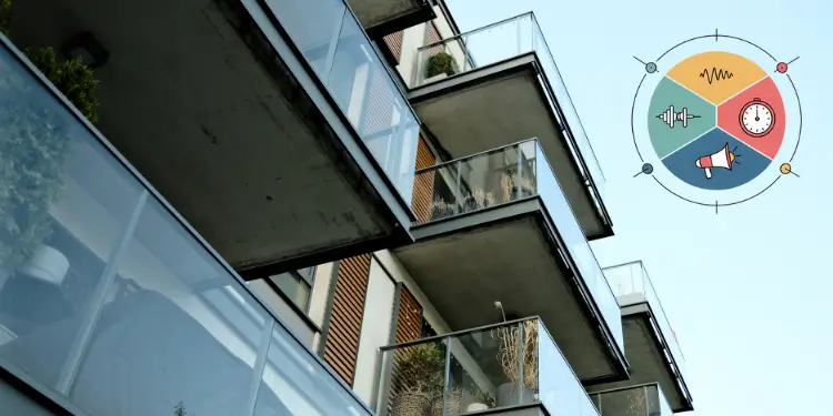 Modern apartment complex with glass balconies and analytical data pie chart graphic.