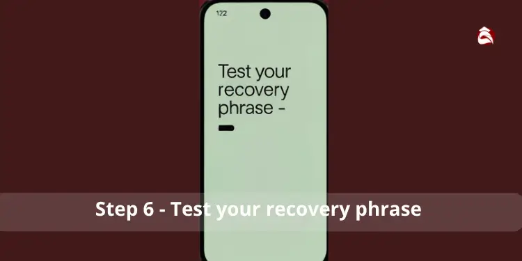 Phone screen showing "Test your recovery phrase" message