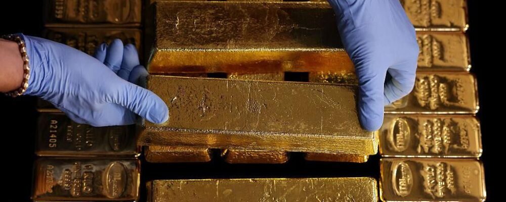 Gold surges past record $4,000 an ounce as uncertainty fuels rally