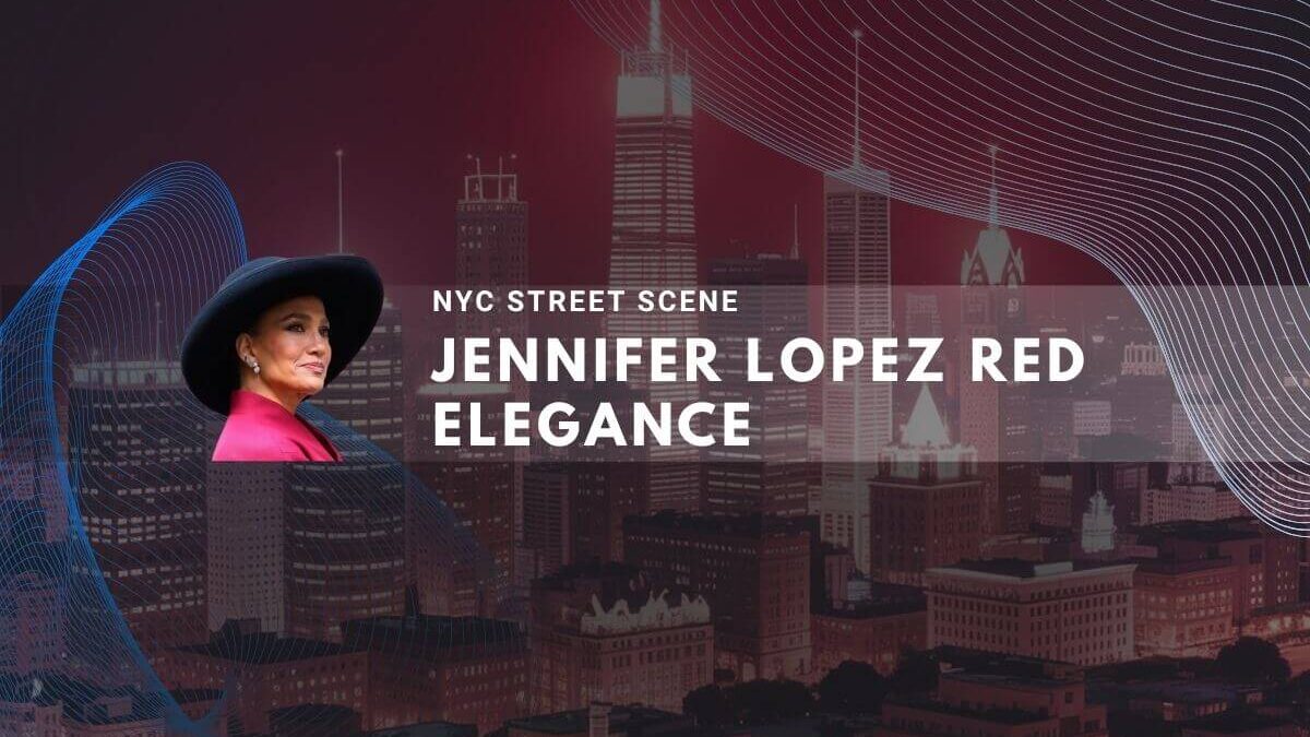 Jennifer Lopez portrait in red with a black hat, set against an NYC skyline background.