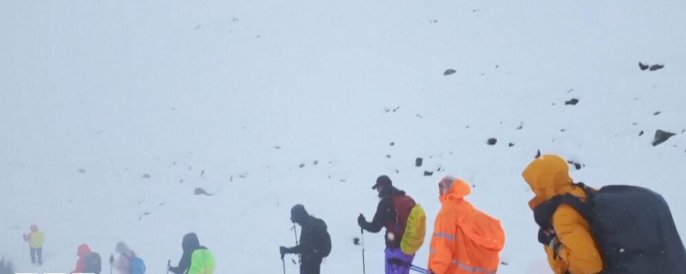 Mount Everest: Race to rescue 200 hikers continues after snowstorm
