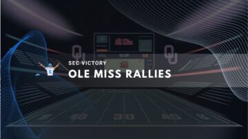 Football field with Ole Miss scoreboard and cheering player