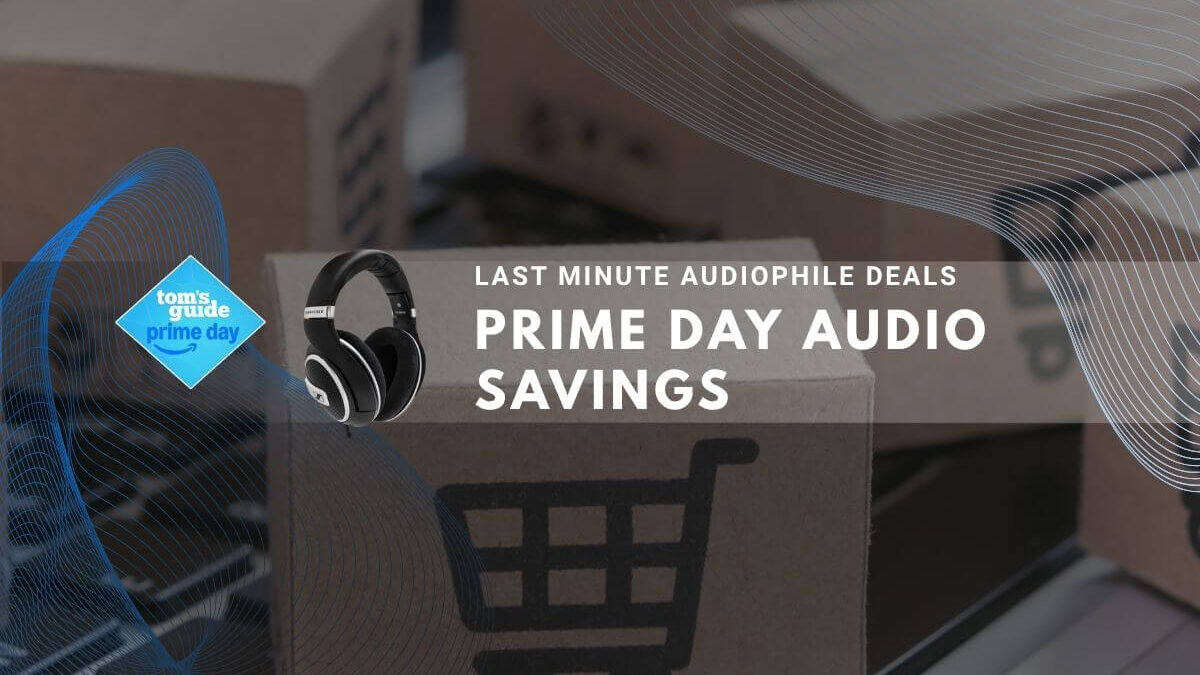 Shopping cart boxes on keyboard with headphones, promoting Prime Day audio savings