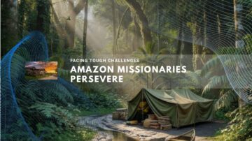 Canvas tent and canoe set beside a river deep in the jungle.