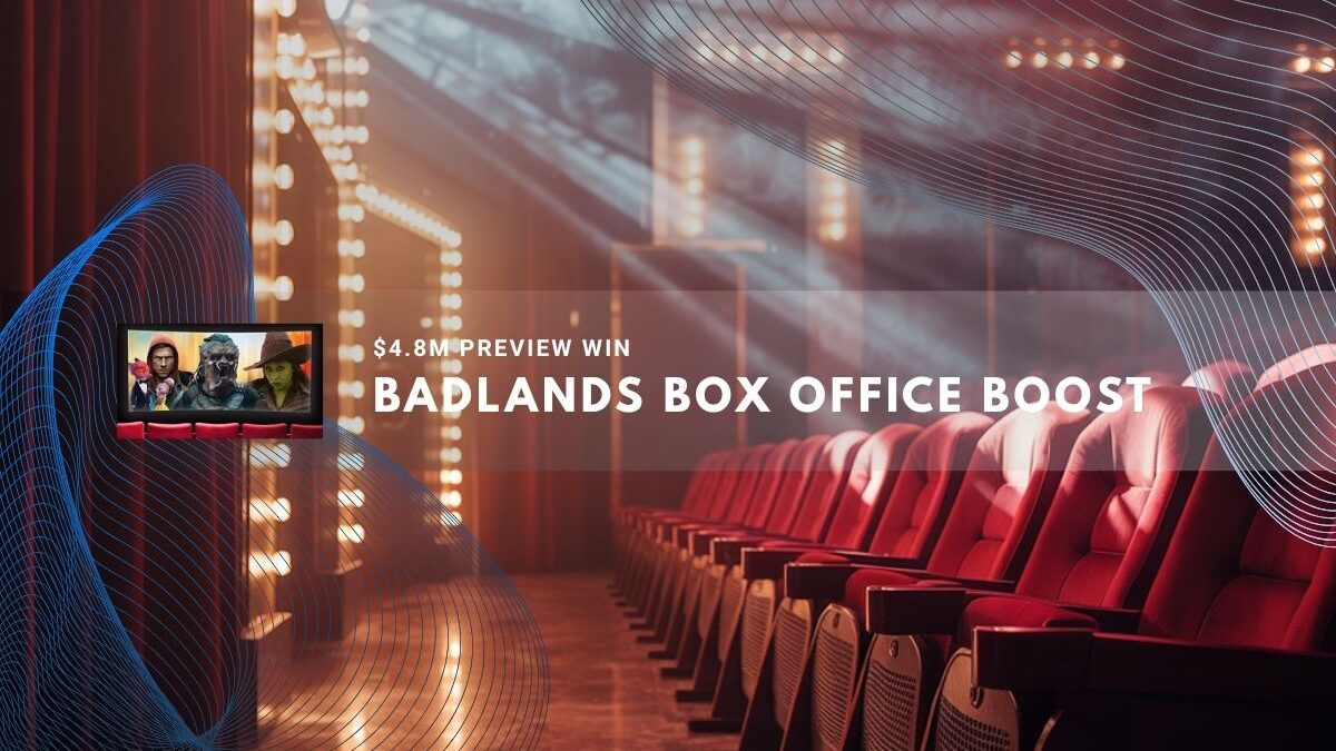 Empty red theater seats lit by bright stage lights and reflections