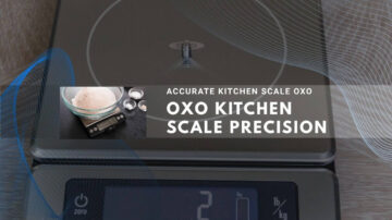 OXO electronic kitchen scale with digital display showing "2" on wooden surface