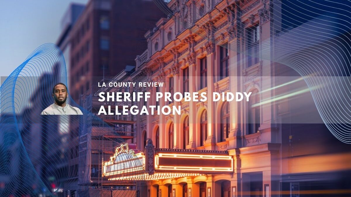 Illuminated theater building in downtown Los Angeles at dusk